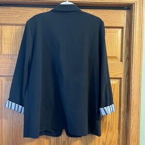 Black blazer with optional turn up cuffs. Size 16